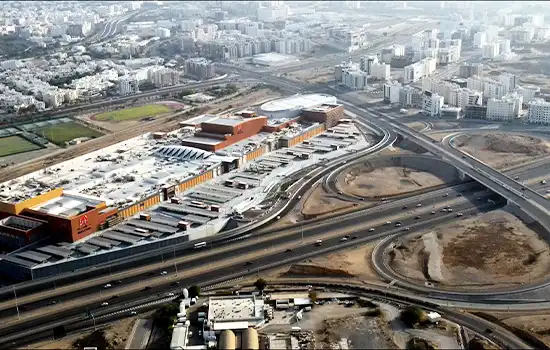 An aerial view of Mall of Oman, the largest shopping complex in Bousher, offering unique features such as Snow Oman and international brands.